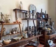 InTandemGallery-pots-on-wooden-shelves