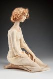 OutinJupiterFarm-red-haired-doll