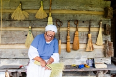 Broom maker Cathy Henson carries on the tradition of making brooms of all styles and sizes.
