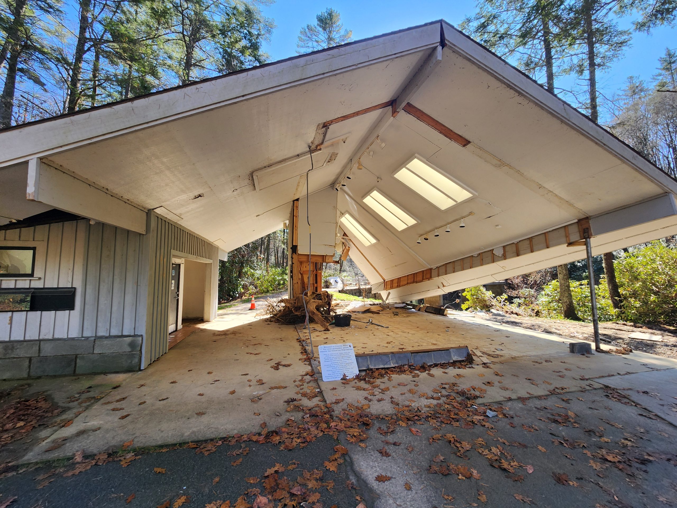 The Linville Falls Visitor Center sits gutted. The roof remains, but the interior was ripped away by Hurricane Helene.